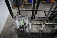 Vertical Material Storage Rack with Contents