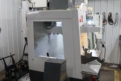 Haas VF-2 CNC Vertical Machining Center, 30"x16"x20"Travels, CT40, 20 ATC, Probing, Thru-Spindle Coolant, 4th Axis Drive - New 2014