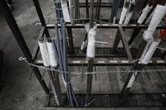 Vertical Material Storage Rack with Contents