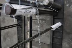 Vertical Material Storage Rack with Contents