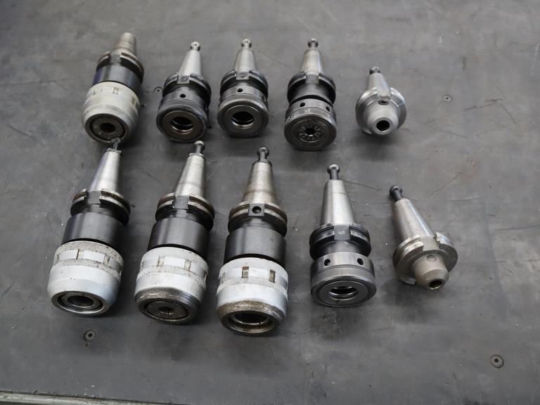CT40 Taper Tool Holders: (4) Nikken KM-1 Collet Holders, (4) XCN-1000 Collet Holders, (1) End Mill Holder