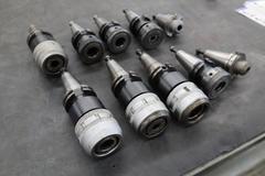 CT40 Taper Tool Holders: (4) Nikken KM-1 Collet Holders, (4) XCN-1000 Collet Holders, (1) End Mill Holder