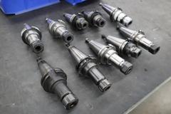 CT40 Taper Tool Holders: (9) Er20 Collet Holders, (1) Nikken SKN-16B Collet Holder