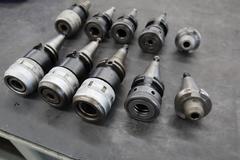 CT40 Taper Tool Holders: (4) Nikken KM-1 Collet Holders, (4) XCN-1000 Collet Holders, (1) End Mill Holder