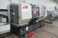 Haas ST-30 CNC Turning Center, Live Milling, 12 Station Turret, 3400 RPM Spindle, Tailstock, Chip Conveyor, Tool Presetter, Bar Feed