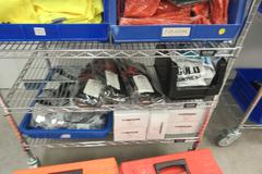 Safety and First Aid Supplies, Large Assortment on Uline 36" x 24" x 78" Metal Wire Rolling Cart