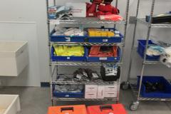 Safety and First Aid Supplies, Large Assortment on Uline 36" x 24" x 78" Metal Wire Rolling Cart