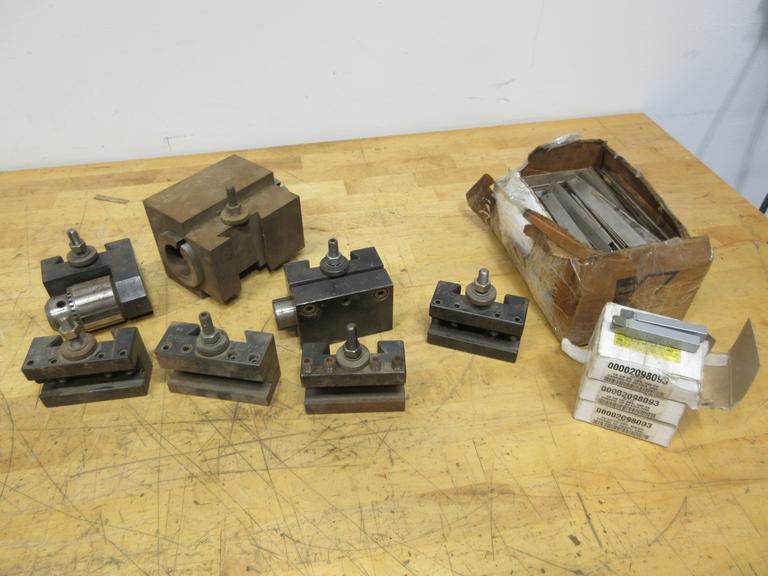 Aloris, Dorian, and Other CXA Quick Change Tool Post Holders, with 3 Boxes (12ea) 3/8 Carbide Tipped Stick Tools, Box of HSS Cutoff Blades