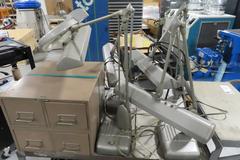Cart with Contents including Desk Top Lamps, Desktop Light Magnifying Lense, Tote of Height Stands and More!
