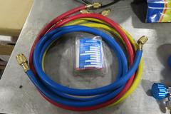Rotary Vane Vacuum Pump with R134A Manifold Gage Set, Refrigerant Charging Hose Set and R-134A Refrigerant and Case.