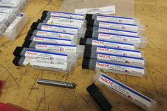 Solid Carbide End Mills **All New In Packages**, (10) Garr 22mm 5FL SQ, (18) Nachi 5/16" 3FL SQ, (7) Redline 3/8" 4FL Ball