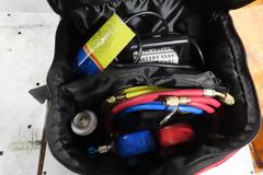Rotary Vane Vacuum Pump with R134A Manifold Gage Set, Refrigerant Charging Hose Set and R-134A Refrigerant and Case.