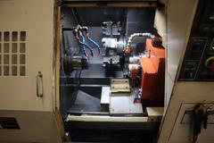 Miyano BND-34S CNC Lathe, C-Axis on Main and Sub-Spindle, 12 Station Turret, Parts Catcher & Conveyor, Chip Conveyor