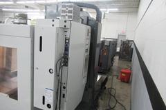 Haas VM-3 5-Axis CNC Vertical Machining Center, Haas TR-210 Trunnion, 40 Station Tool Changer, Probing, 300 PSI TSC, Chip Auger