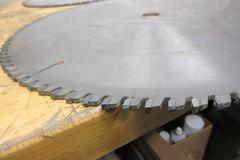 Cut-Off Saw Blades (4) Carbide Tipped Nap Gladu, Leuco and Other 16" x 1" **Used But Still Sharp**, (1) Hitachi 15" x 1" Wood Miter Saw Blade **Looks Unused**