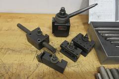 Aloris CXA Tool Post and (4) Assorted Holders, with Everede Tool Co. Boring Bar Set with Sleeves and Cutting Inserts