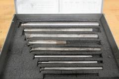 Aloris CXA Tool Post and (4) Assorted Holders, with Everede Tool Co. Boring Bar Set with Sleeves and Cutting Inserts
