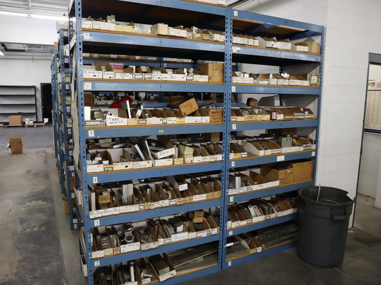 Teardrop Style Racking (2) 4' Sections, (16) Shelves,  with Contents of Mostly Aluminum Fixture Plates with Steel Hardware