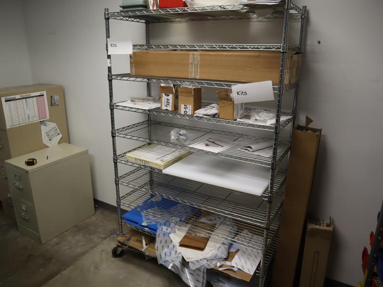 Rolling Adjustable Shelf Wire Racking with 10 Shelves and Contents
