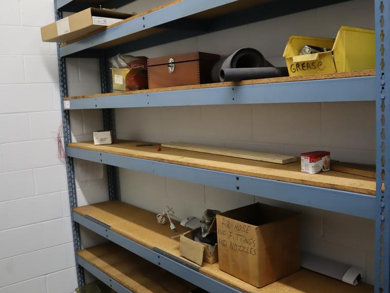 Teardrop Style Adjustable Shelf Racking with 7 Shelves with Assorted Contents