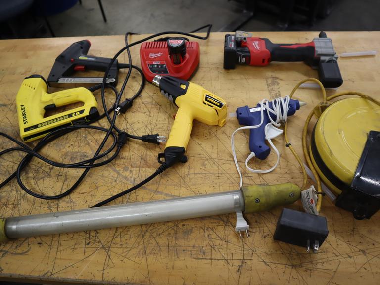 Milwuakee M12 Cordless Rivet Too., (2) Stanley Electric Staplers, Wagner Heat Gun, Extension Cord Reel, Glue Gun