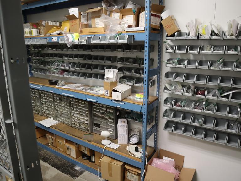 Wall with Teardrop Style Adjustable Racking 5 Shelves, and Mounted Bins with Contents, Hardware, Fasteners, Heli Coil Thread Inserts, and More