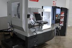 Haas UMC-400SS CNC 5-Axis Vertical Machining Center, Ct40, 12K RPM, 30 ATC, Probing, 230mm Diameter Work Platter, High Speed Machining, Programmable Coolant Nozzle, Chip Auger