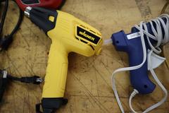 Milwuakee M12 Cordless Rivet Too., (2) Stanley Electric Staplers, Wagner Heat Gun, Extension Cord Reel, Glue Gun