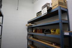 Teardrop Style Adjustable Shelf Racking with 7 Shelves with Assorted Contents