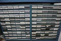Teardrop Style Adjustable Shelf Racking with 6 Shelves with Assorted Contents of Multi Bin Organizers with Fasteners and Hardware