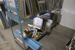 Teardrop Style Racking (2) 4' Sections, (10) Shelves,  with Contents of Mostly Aluminum Fixture Plates with Steel Hardware