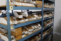 Teardrop Style Racking (2) 4' Sections, (15) Shelves,  with Contents of Mostly Aluminum Fixture Plates with Steel Hardware, And Tooling