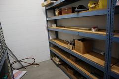 Teardrop Style Adjustable Shelf Racking with 7 Shelves with Assorted Contents
