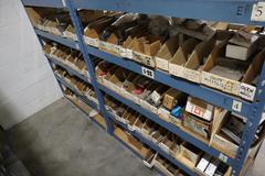 Teardrop Style Racking (2) 4' Sections, (16) Shelves,  with Contents of Mostly Aluminum Fixture Plates with Steel Hardware