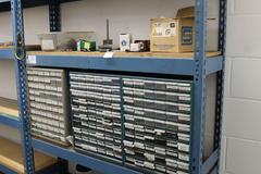 Teardrop Style Adjustable Shelf Racking with 6 Shelves with Assorted Contents of Multi Bin Organizers with Fasteners and Hardware