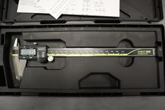Digital Micrometers (1) 8" Asimeto, (1) 8" Mitutoyo, (1) 12" SPI, and (1) 6" Asimeto Dial Caliper