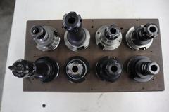 ER16 Collet Type CAT40 Tool Holders (8pcs) In Wood Rack