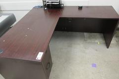 L-Shaped Office Desk with 2 Drawer Cabinet, Laminate Wood Top and Assorted Contents