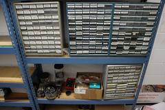 Teardrop Style Adjustable Shelf Racking with 6 Shelves with Assorted Contents of Multi Bin Organizers with Fasteners and Hardware