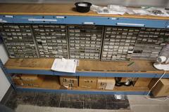 Wall with Teardrop Style Adjustable Racking 5 Shelves, and Mounted Bins with Contents, Hardware, Fasteners, Heli Coil Thread Inserts, and More