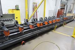 Elumatec SBZ 5-axis CNC Profile Machining Center, 5-Axis CNC Control, 10.3M / 33.8' X-Axis Travel, 20-ATC, 500mm Blade, 24,000 RPM