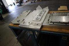 Teardrop Style Racking (1) Section with Contents of Mostly Aluminum Fixture Plates with Steel Hardware