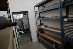 Teardrop Style Adjustable Shelf Racking with 6 Shelves with Assorted Contents