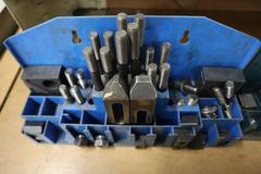 Clamp Hardware In Racks and Bins, Mostly 1/2", Studs, Nuts, Risers, Strap Clamps and More