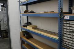Teardrop Style Adjustable Shelf Racking with 6 Shelves with Assorted Contents