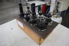 ER16 Collet Type CAT40 Tool Holders (8pcs) In Wood Rack