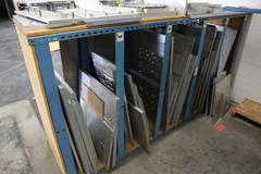 Teardrop Style Racking (1) Section with Contents of Mostly Aluminum Fixture Plates with Steel Hardware