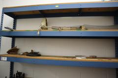 Teardrop Style Adjustable Shelf Racking with 6 Shelves with Assorted Contents