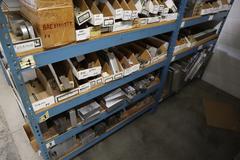 Teardrop Style Racking (2) 4' Sections, (15) Shelves,  with Contents of Mostly Aluminum Fixture Plates with Steel Hardware, And Tooling