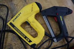Milwuakee M12 Cordless Rivet Too., (2) Stanley Electric Staplers, Wagner Heat Gun, Extension Cord Reel, Glue Gun